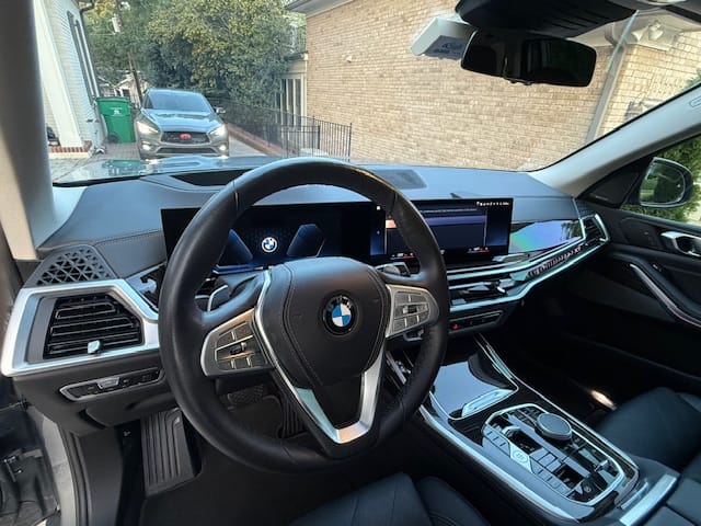 BMW X5 interior dashboard and steering wheel after a full interior detail