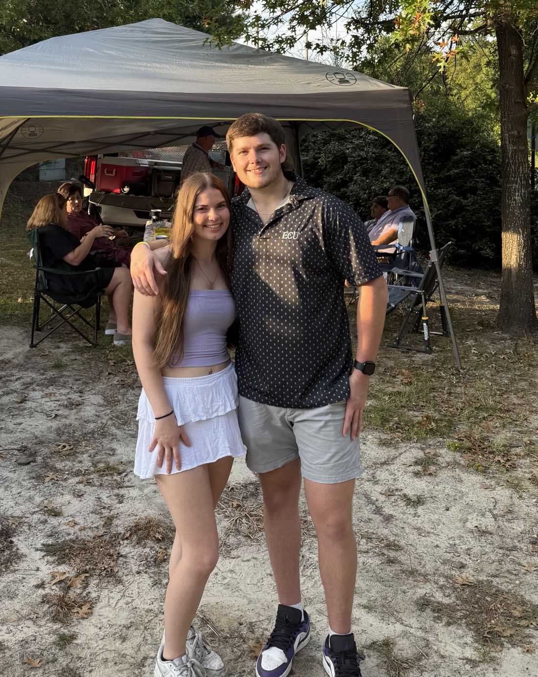 Tyler, the owner of Driveway Gloss, with his girlfriend